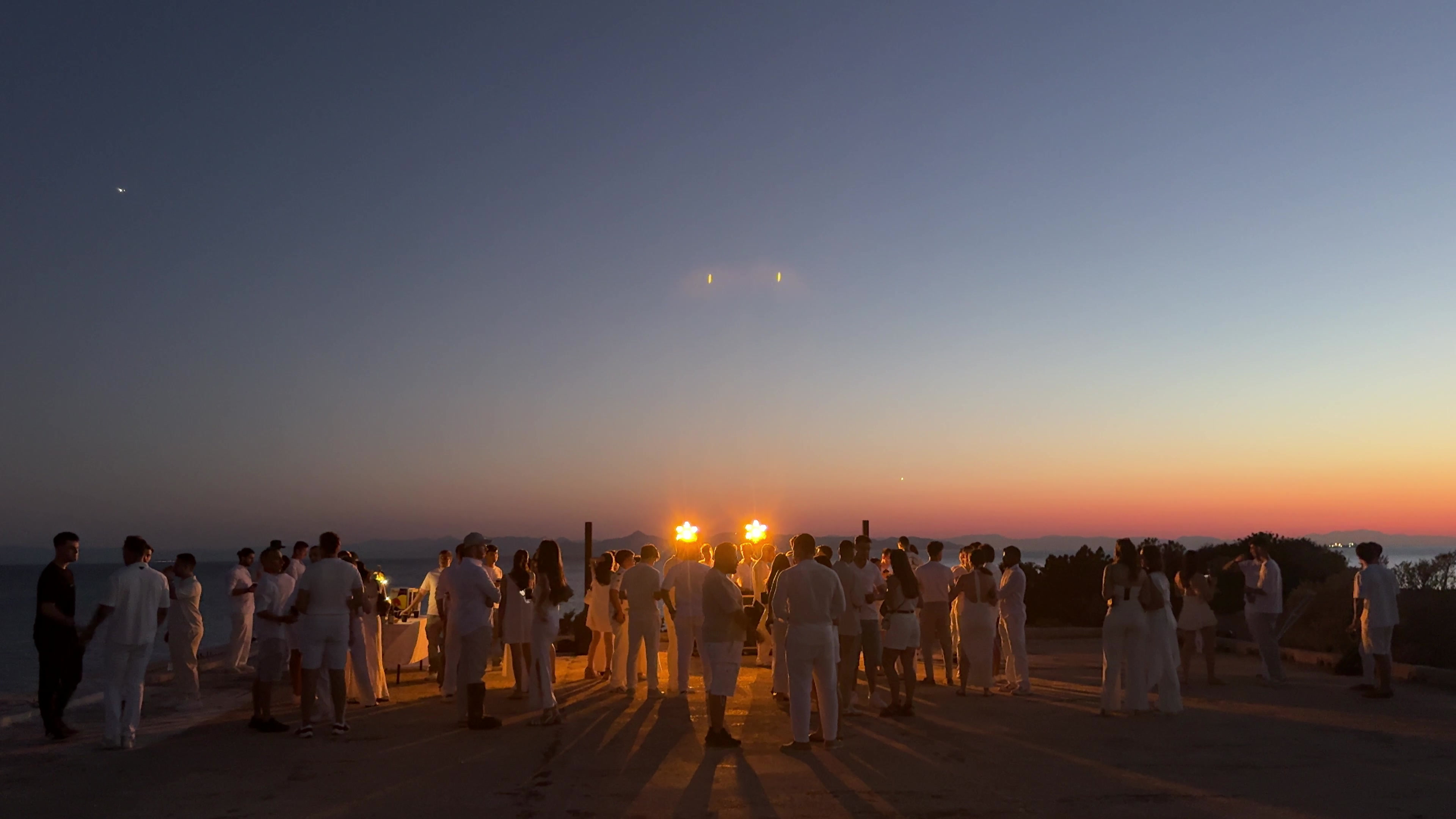 The Hustle Hours community getting together at sunset